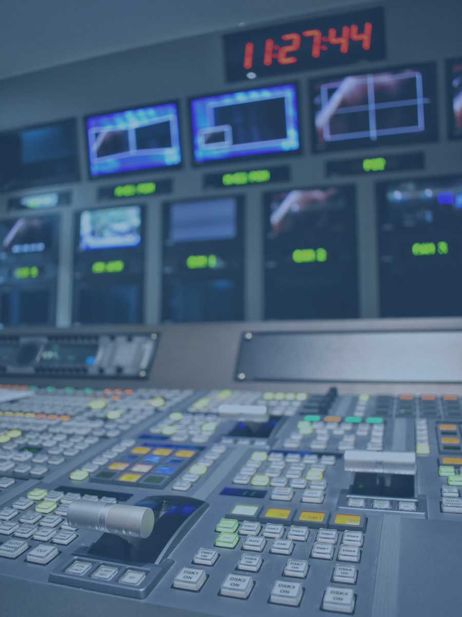Inside TV broadcasting station control room.