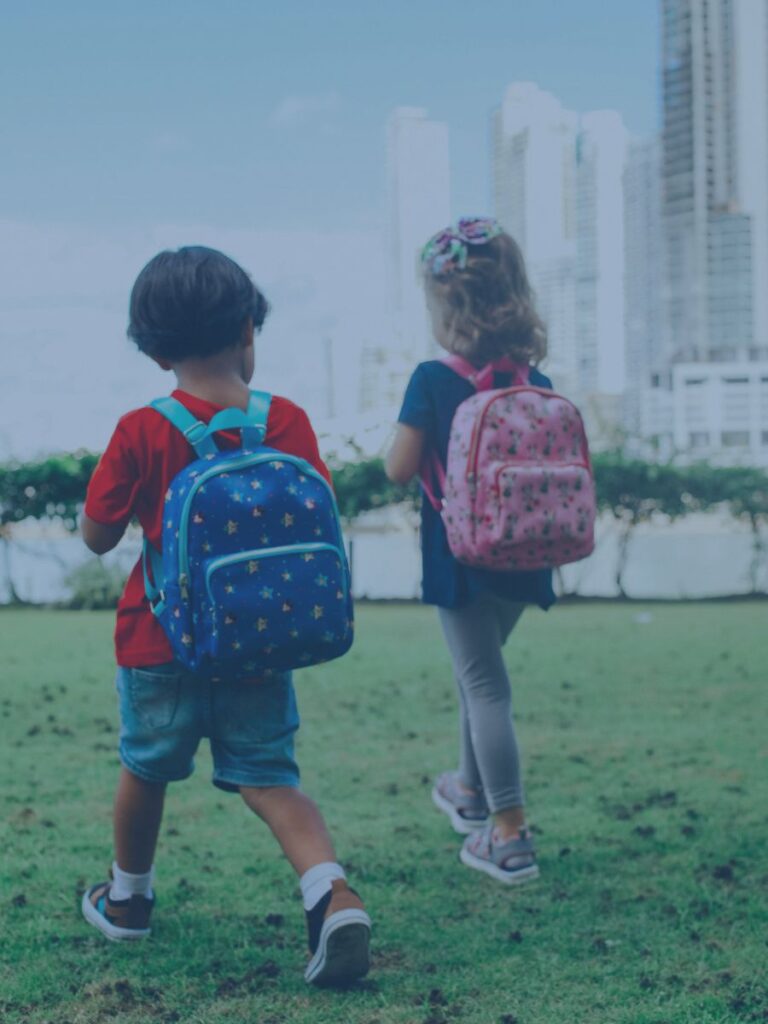 Kids walking with backpacks.